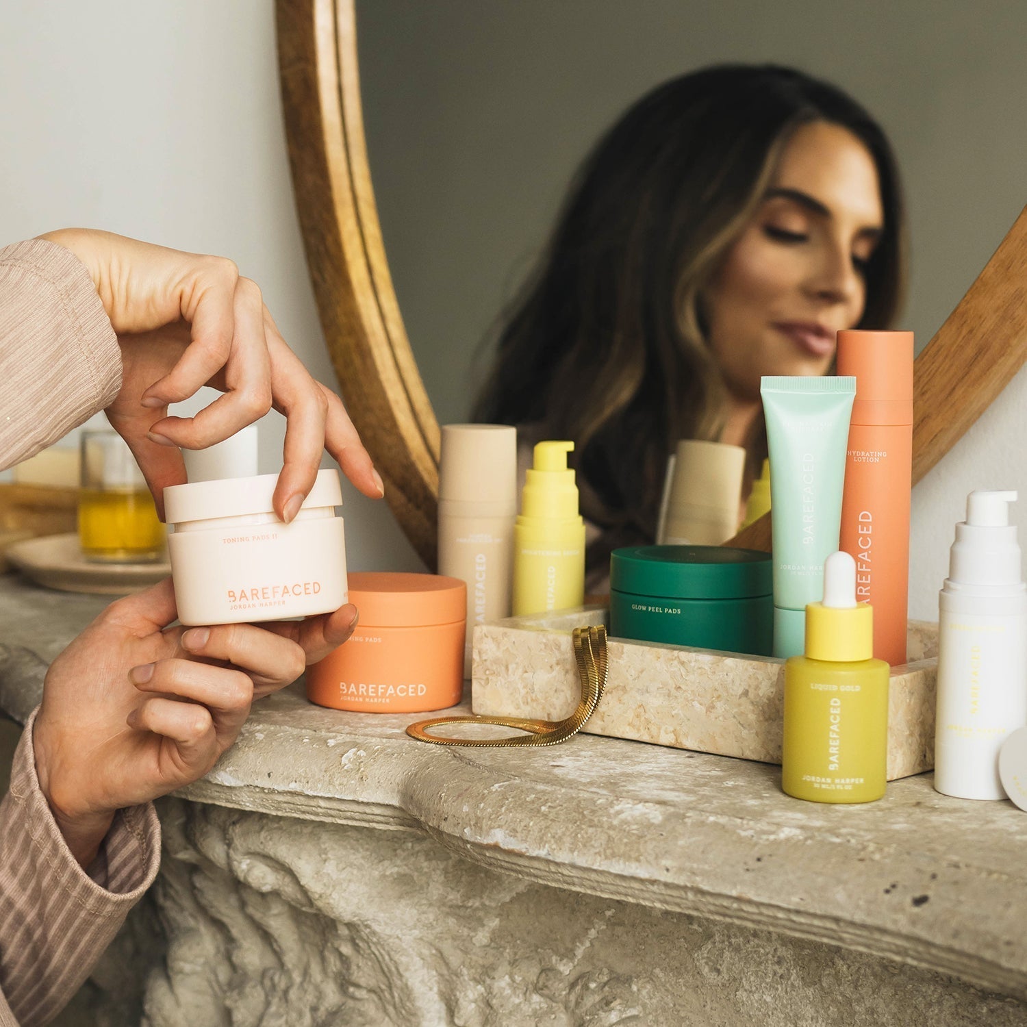Jordan Harper with a lineup of Barefaced products