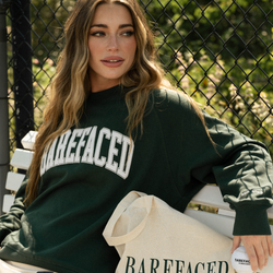 Woman wearing Barefaced Varsity Crewneck sweatshirt